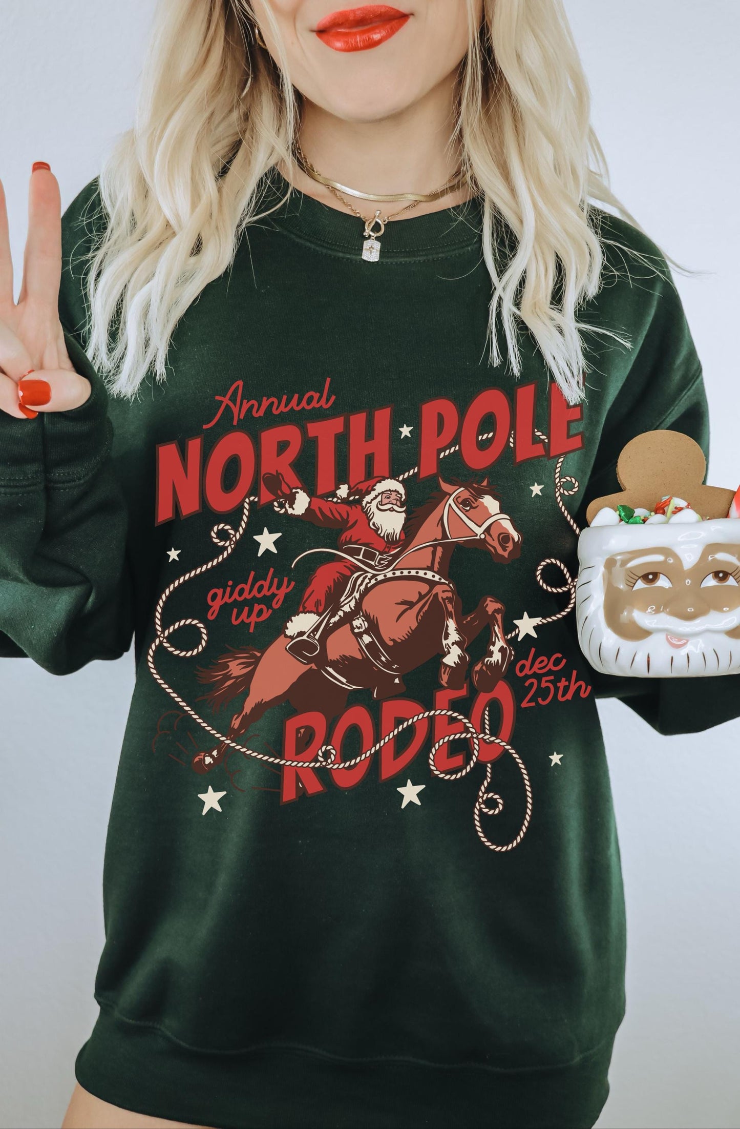 North Pole Rodeo Shirt, North Pole Sweatshirt, Cowboy Santa Sweatshirt, Retro Santa Sweatshirt, Vintage Christmas Crewneck, Holiday Sweaters