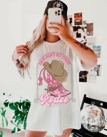 This Aint My First Rodeo Shirt, Cowgirl Rodeo Shirt, Western Graphic Tee, Trendy Western Shirt, Cowgirl Tee, Country Concert Tee, Rodeo Tee