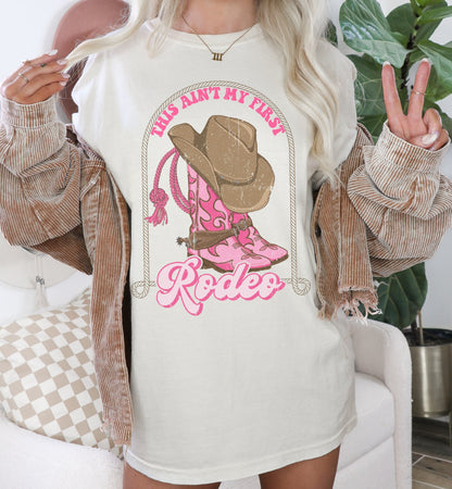 This Aint My First Rodeo Shirt, Cowgirl Rodeo Shirt, Western Graphic Tee, Trendy Western Shirt, Cowgirl Tee, Country Concert Tee, Rodeo Tee